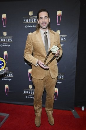 Green Bay Packers Aaron Rodgers poses with the AP Most Valuable Player trophy during the NFL Honors in Los Angeles NFL Honors, Los Angeles, United States - February 10, 2022