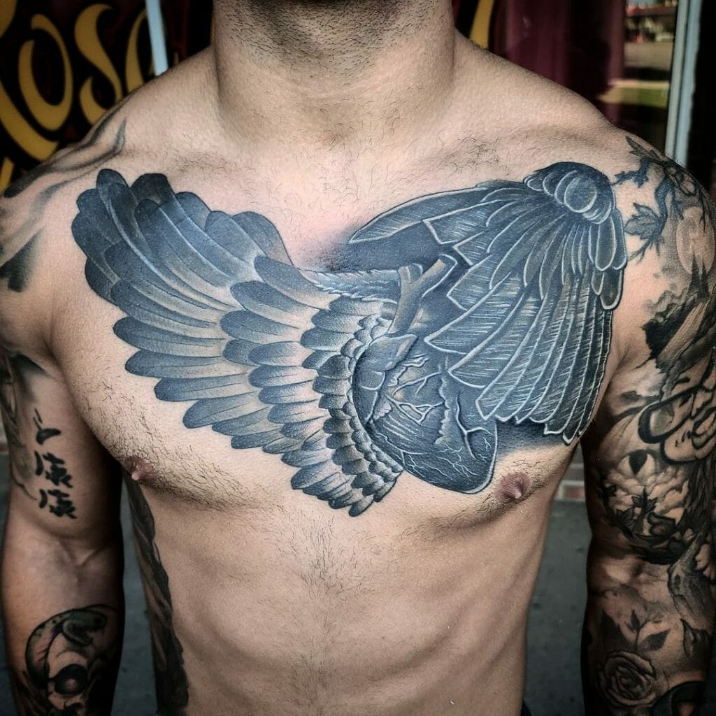 Black and gray shaded wings tattoo designs