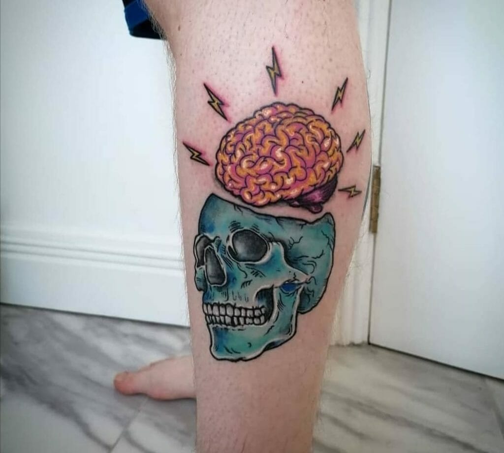 Brain emerging from a skull tattoo