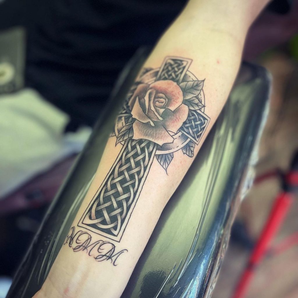 Celtic cross and rose tattoo