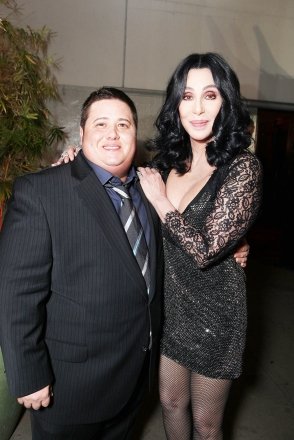 HOLLYWOOD - NOVEMBER 15: **EXCLUSIVE** Chaz Bono and Cher at the Screen Gems Los Angeles premiere of 'Burlesque' at Grauman's Chinese Theater on November 15, 2010 in Hollywood, California.  Chaz Bono Cher Screen Gems Los Angeles Premiere of 