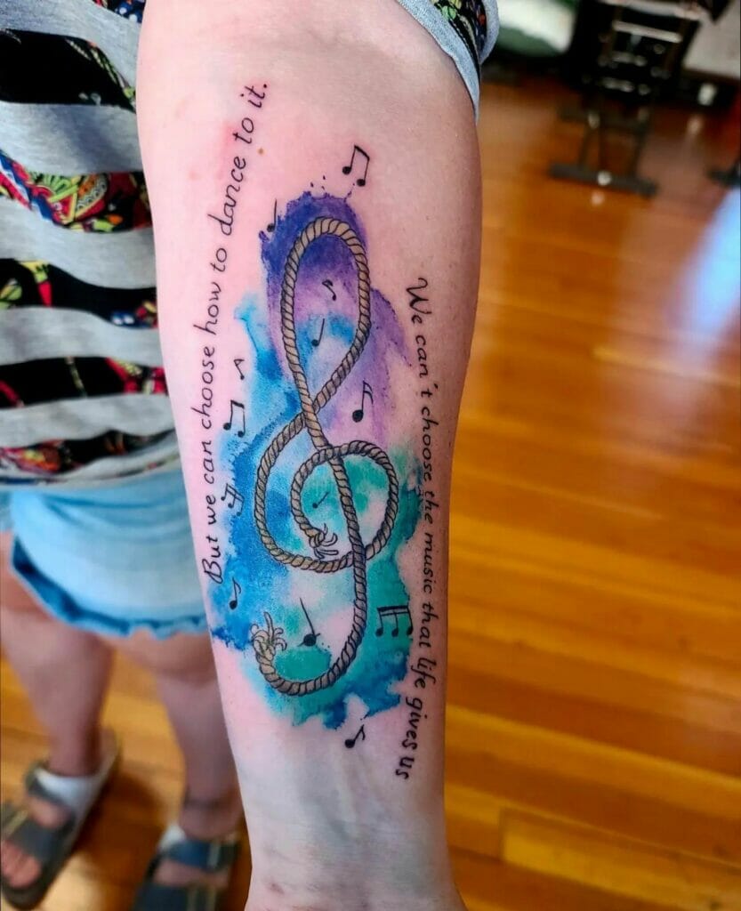 Colorful music notes tattoo