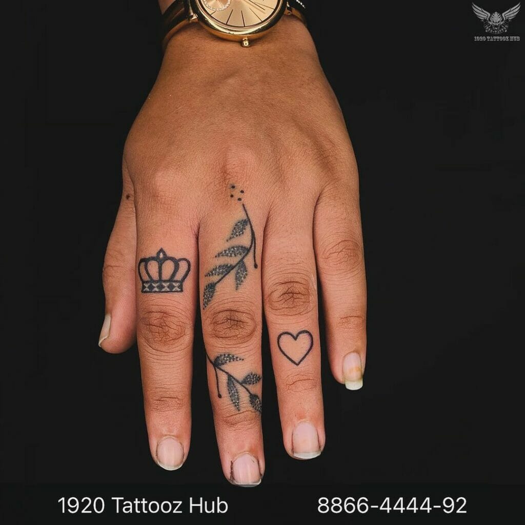Crown index finger tattoo