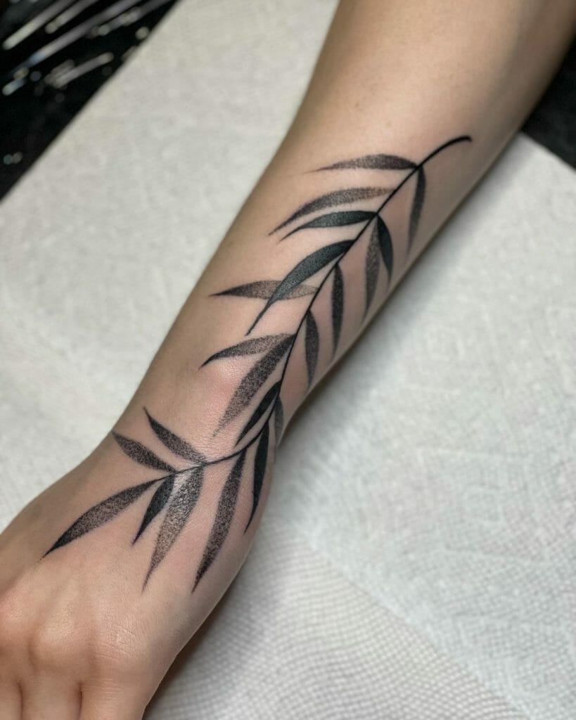 Delicate vine wrist tattoo