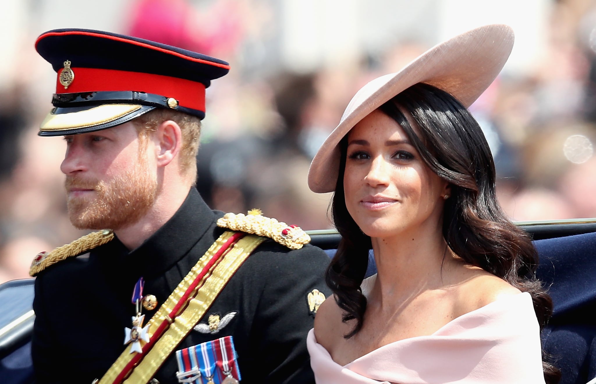 LONDON, ENGLAND - JUNE 9: Meghan, Duchess of Sussex and Prince Harry, Duke of Sussex during Trooping The Color at The Mall on June 9, 2018 in London, England.  The annual ceremony, attended by over 1,400 guards and cavalrymen, is believed to have been performed for the first time during the reign of King Charles II.  The parade marks the sovereign's official birthday, although the Queen's actual birthday is on April 21st.  .  (Photo by Chris Jackson/Getty Images)