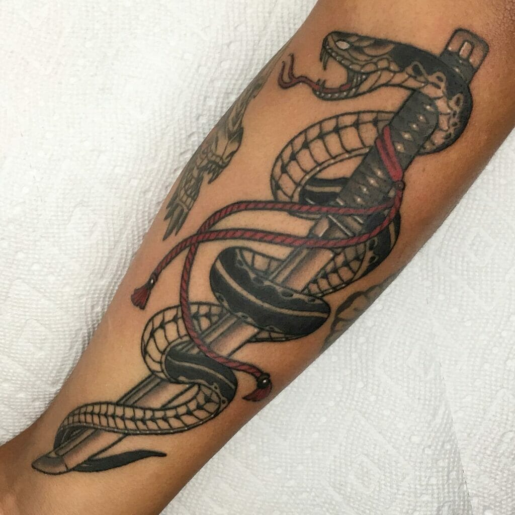 Wild snake and red rope sword tattoo
