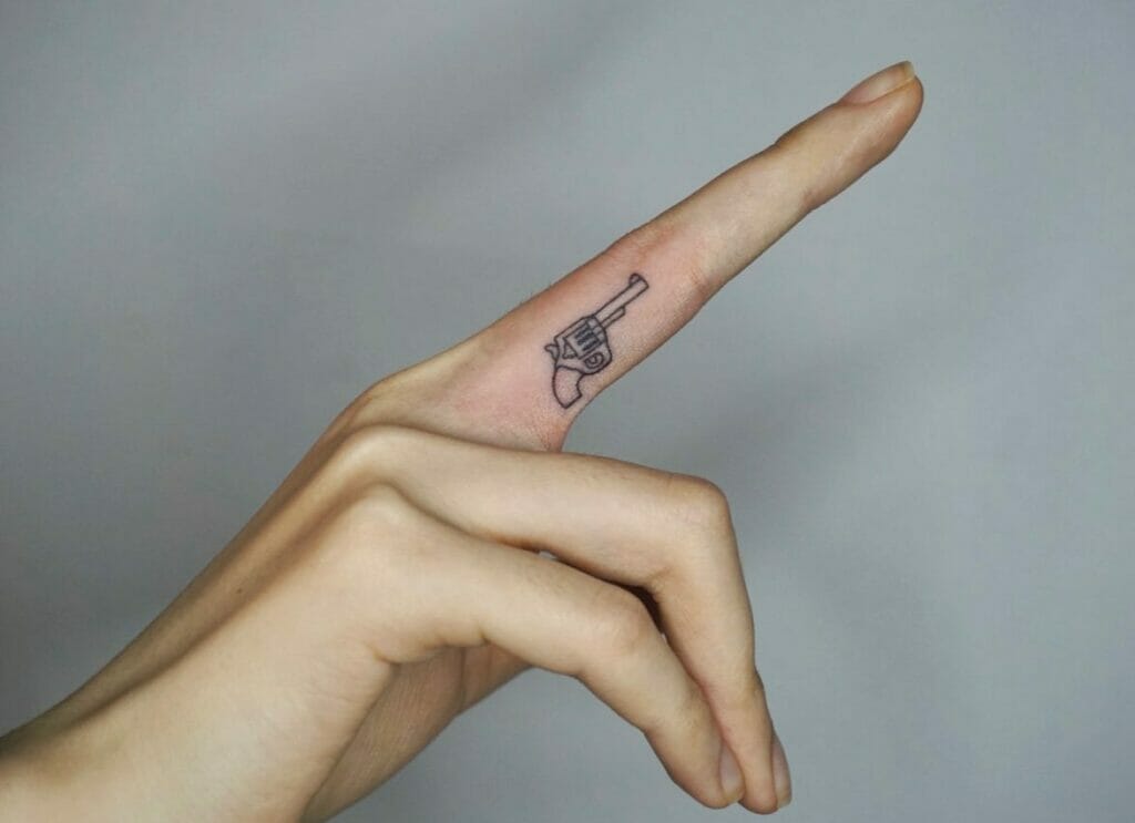 Finger Tattoos Gun Tattoo Design