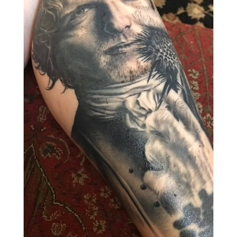 Intricate Jamie Fraser tattoo