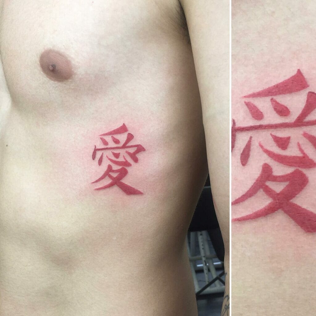 Japanese love kanji tattoo under chest