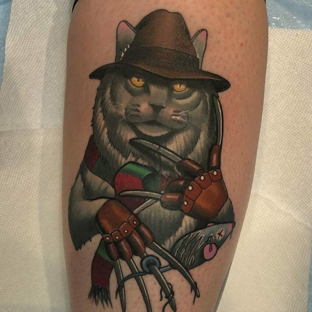 Freddy Krueger kitty themed tattoo on leg