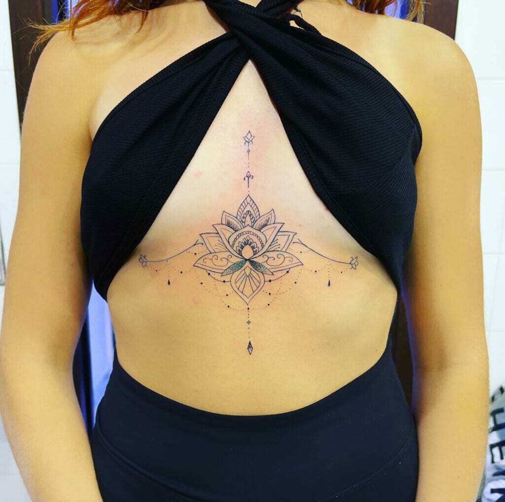 Lace mandala under breast tattoos