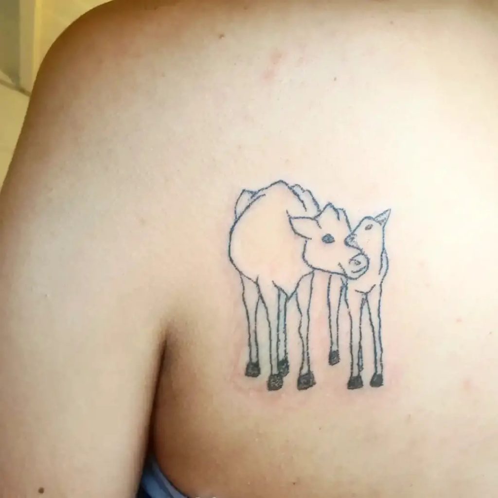 Beautiful cow with her baby tattoo ideas