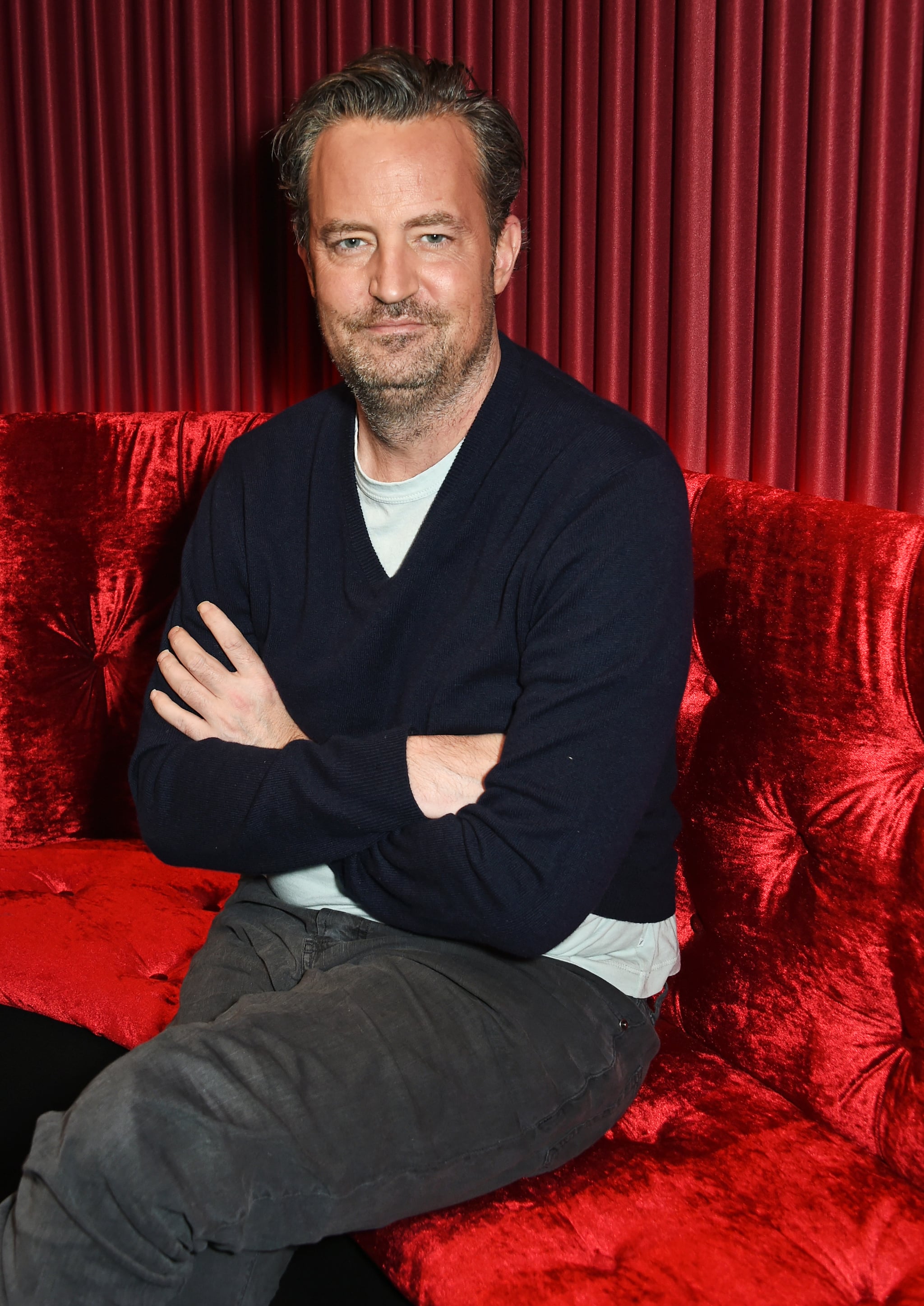 LONDON, ENGLAND - FEBRUARY 8: Matthew Perry poses at a photocall for 