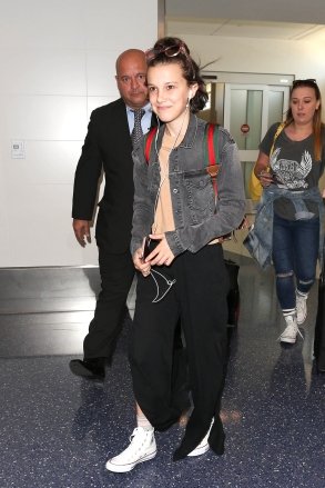 Millie Bobby Brown is seen at LAX in Los Angeles, California.  Image: Millie Bobby Brown Ref: SPL1494811 090517 NOT EXCLUSIVE Image from: SplashNews.com Splash News and Pictures USA: +1 310-525-5808 London: +44 (0)20 8126 1009 Berlin: +49 175 3764 166 photodesk@ splashnews .com World rights, no France rights