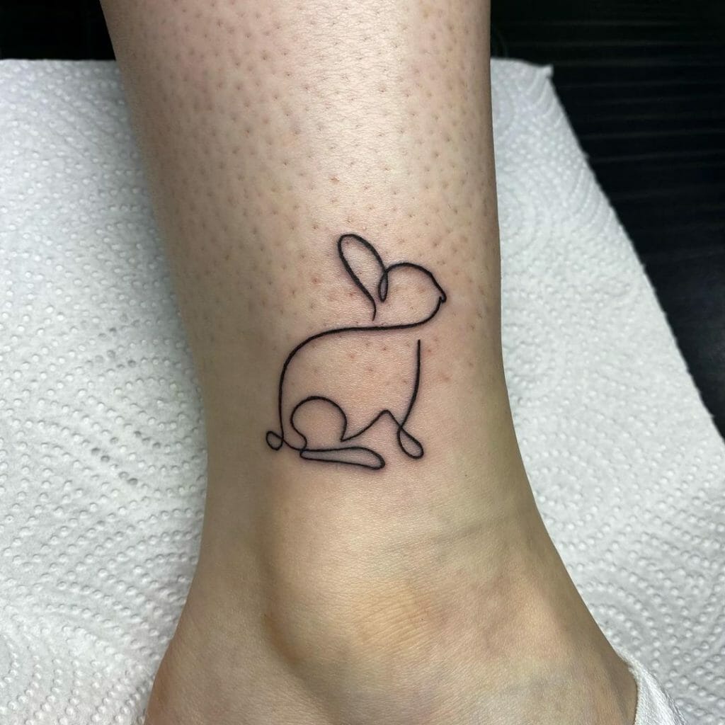 Minimalist bunny tattoo