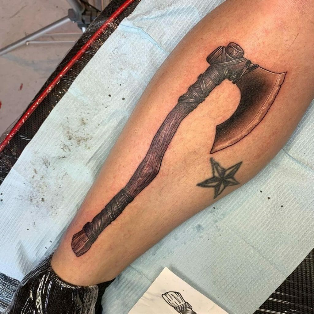 Monochromatic viking ax tattoo 