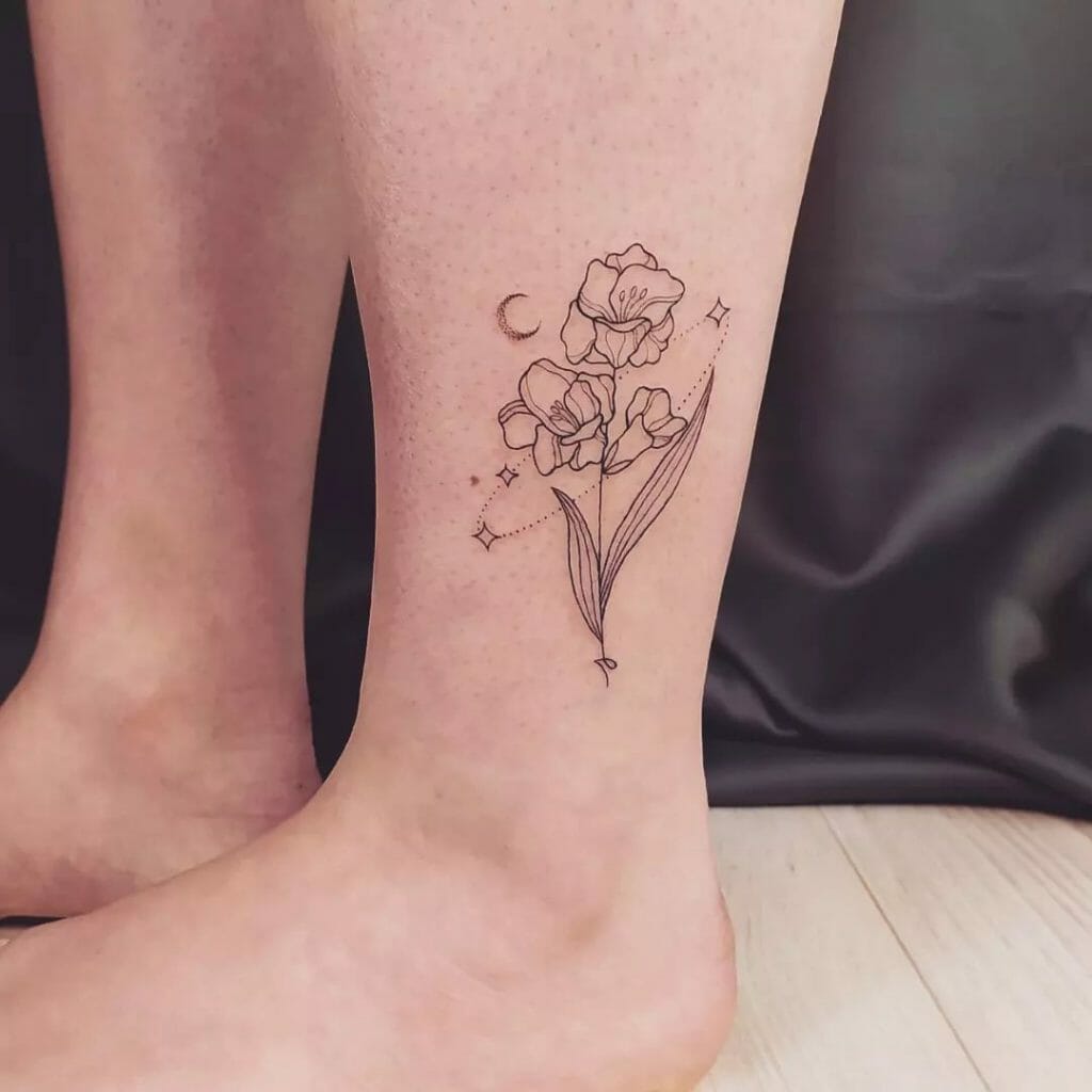 Moon and gladiolus flower tattoo