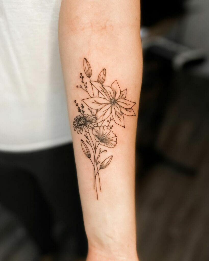 Morning glory with other beautiful flowers tattoo