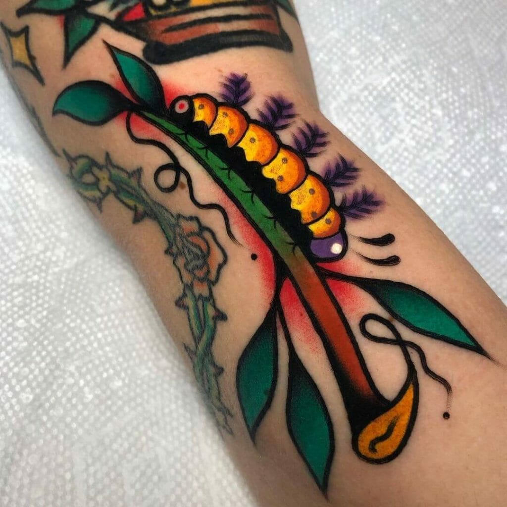 Multicolored caterpillar tattoo