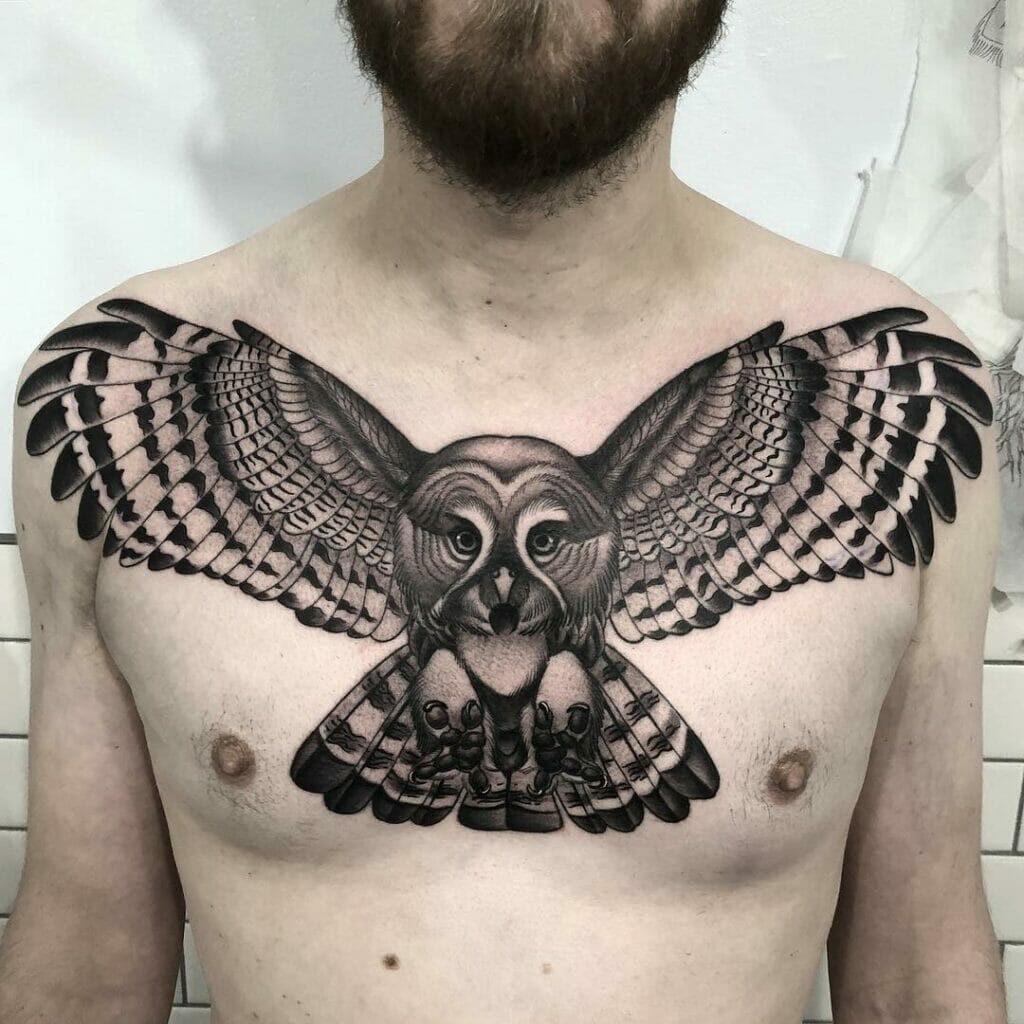 Owl chest piece tattoo