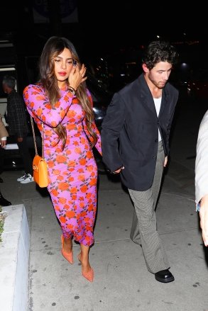 West Hollywood, CA - The Jonas Brothers are in town for a good night out!  The siblings strolled into Catch Steak in their best clothes while celebrating a birthday party.  Pictured: Nick Jonas, Priyanka Chopra BACKGRID USA 27 OCTOBER 2022 USA: +1 310 798 9111 / usasales@backgrid.com UK: +44 208 344 2007 / uksales@backgrid.com Publication*