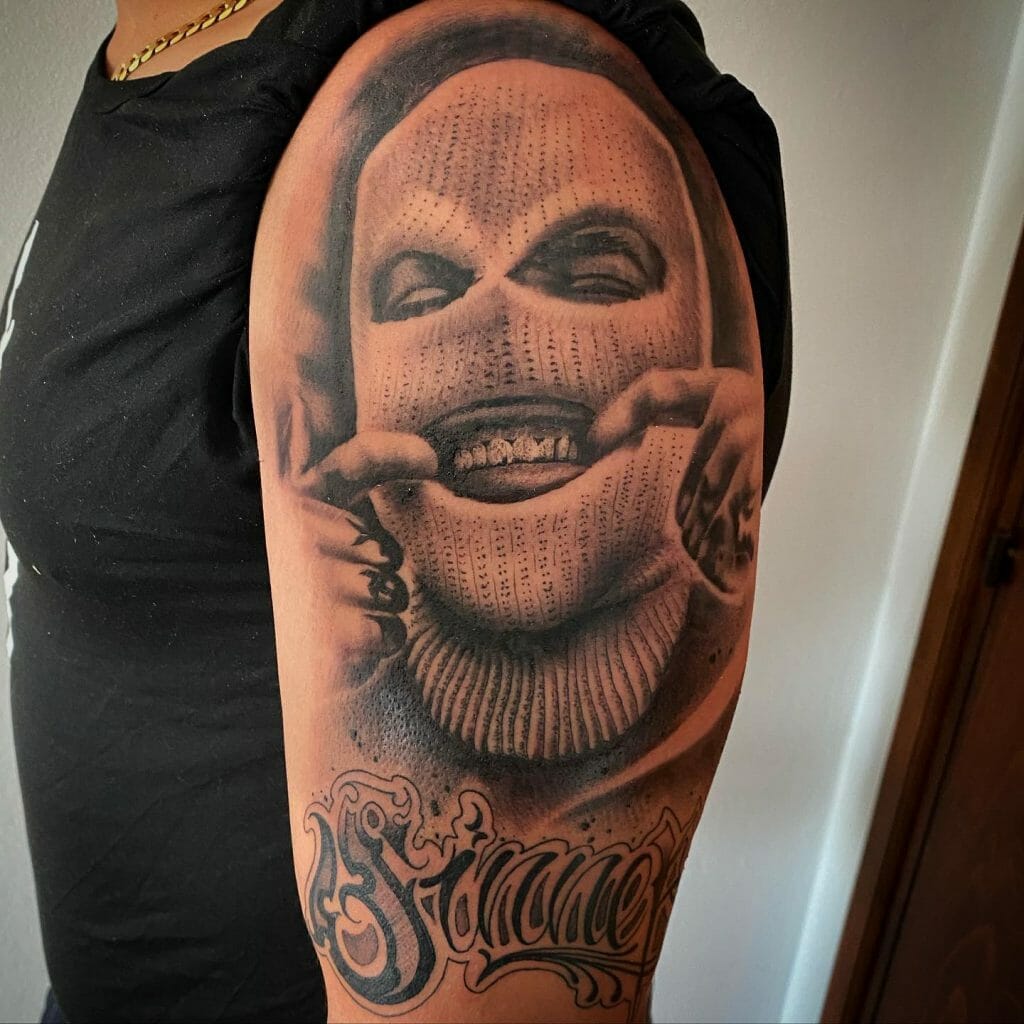 Sinner tattoo with a mask on