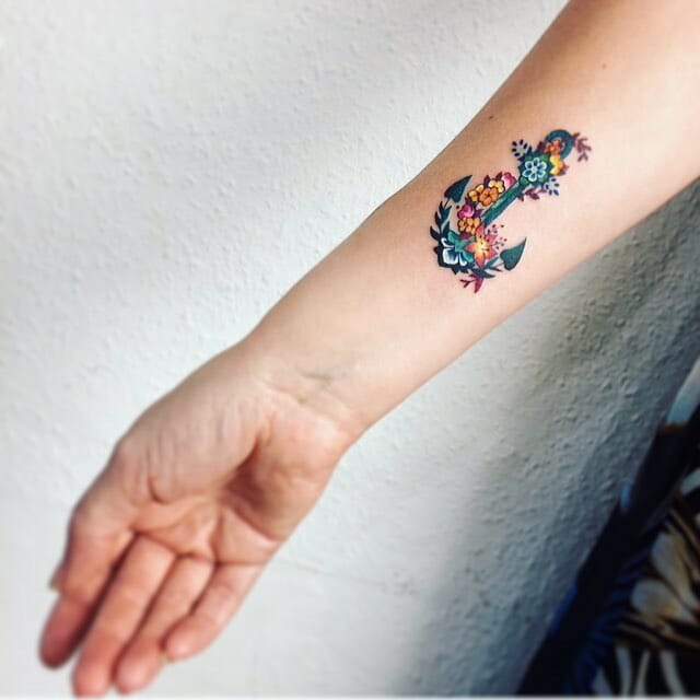 Small floral anchor tattoo