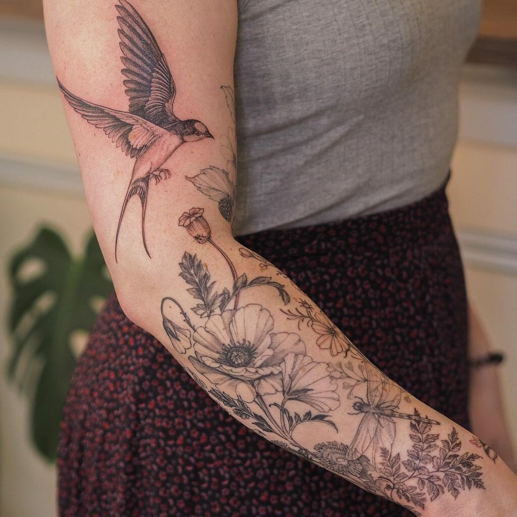 Swallow Hand Garden Tattoo