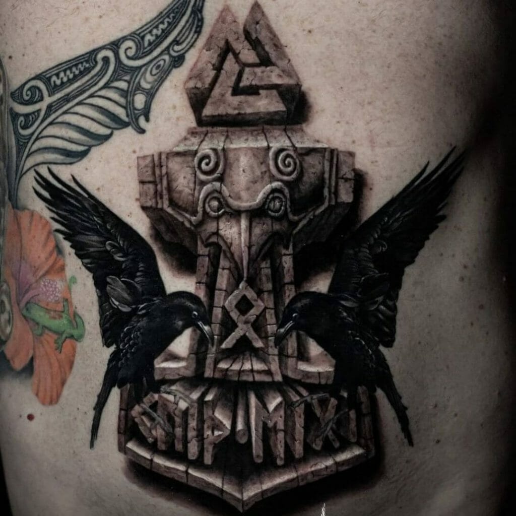 Tattoo combining Mjolnir and Huginn and Munnin