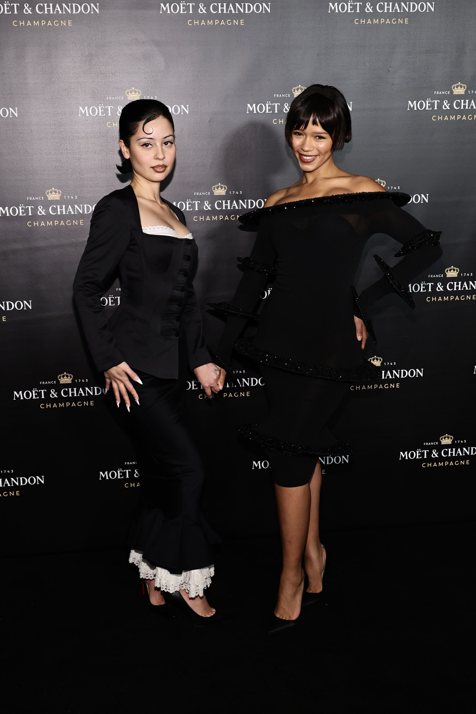 Alexa Demie and Taylor Russell attend Moet Chandon's Christmas Party at Lincoln Center on December 5, 2022...