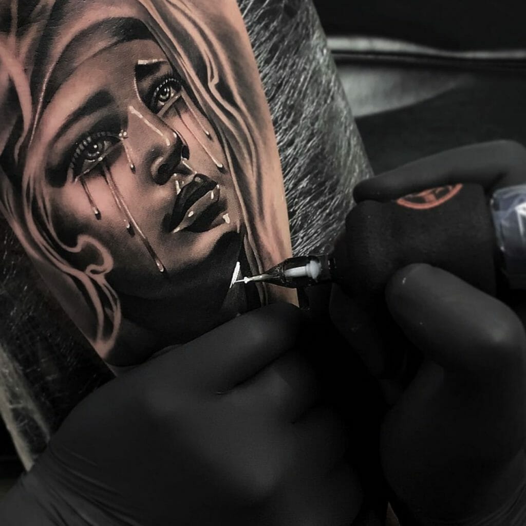 Tears Through The Eyes Of The Virgin Mary Tattoo