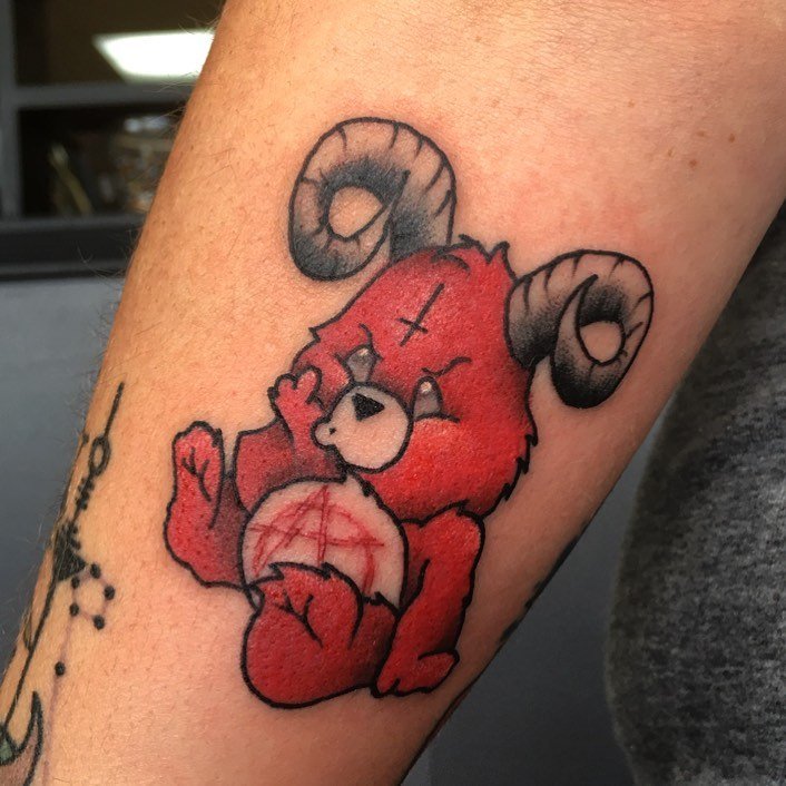 The devilish Care Bear tattoo