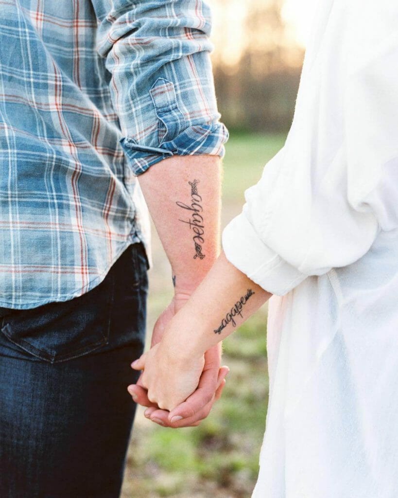 The double arm agape couple tattoo