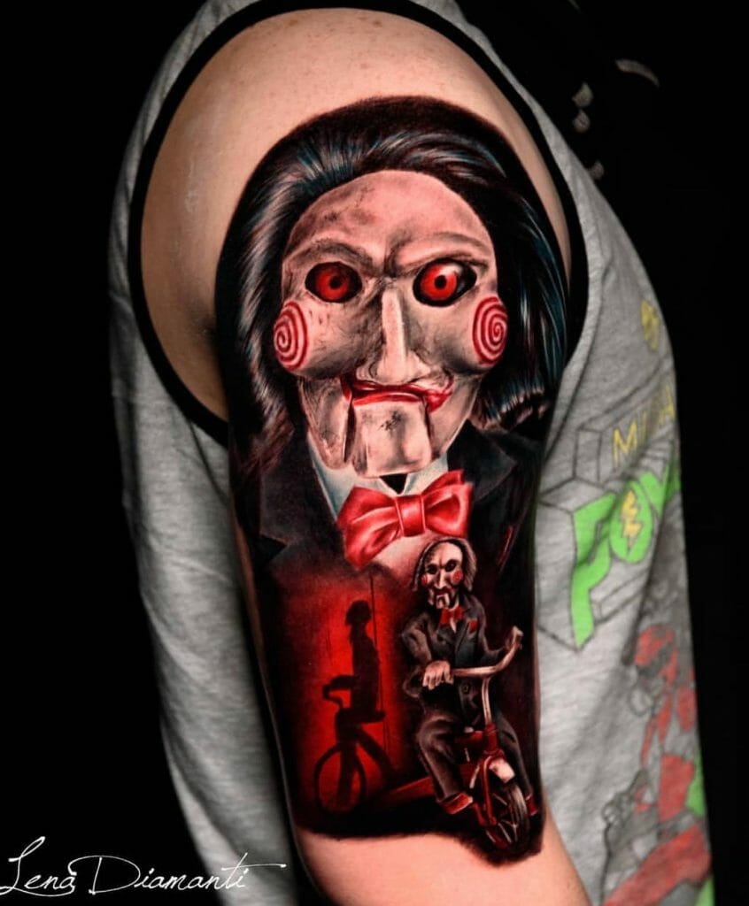 The creepy Billy the Puppet taboo tattoo on the shoulder