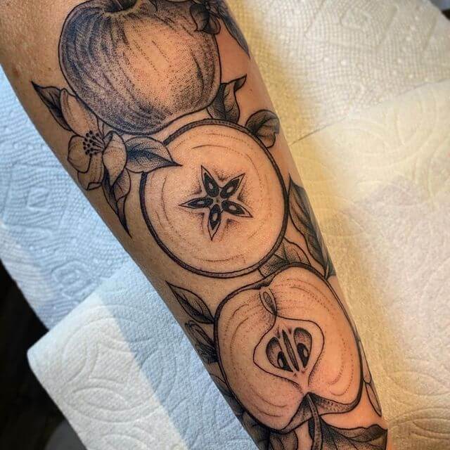 The sensual cut apple tattoo for the passionate
