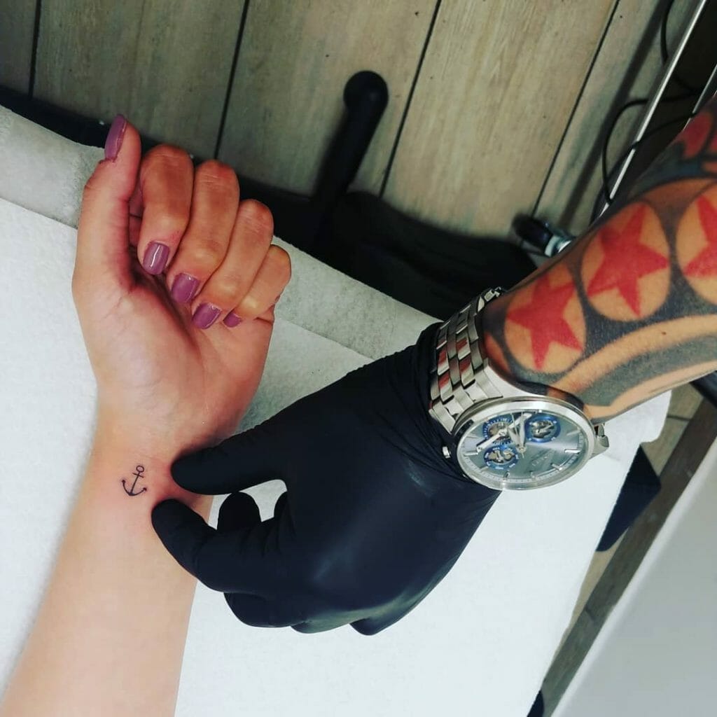 Tiny anchor tattoo