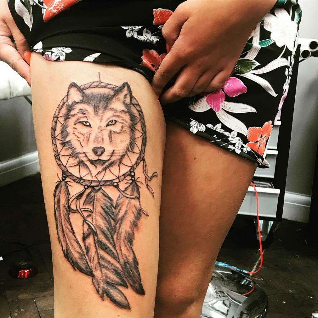 Wolf dreamcatcher tattoo on thigh