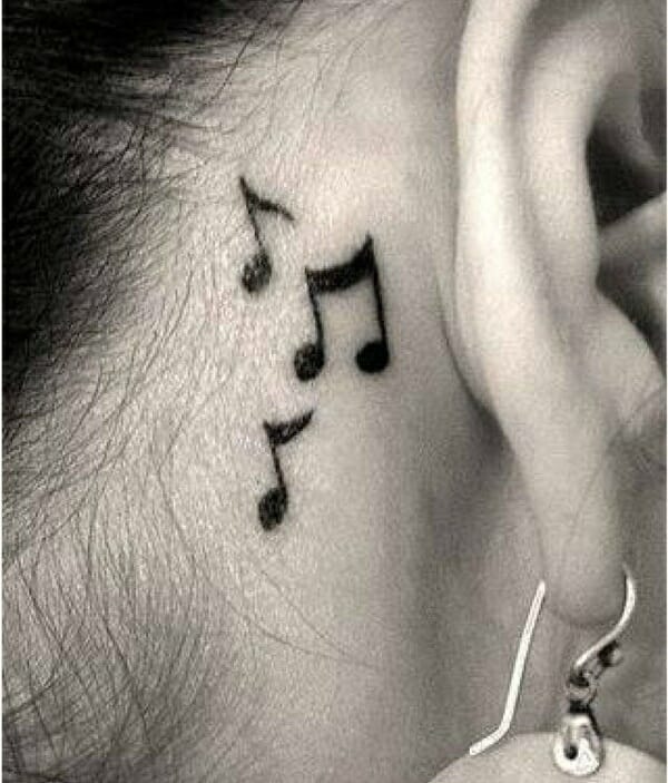 Woman Music Tattoo