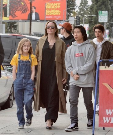 Los Angeles, CA - *EXCLUSIVE* - Actress Angelina Jolie takes her kids Pax and Vivienne to shop on trendy Melrose Ave, then stop for ice cream treats at Baskin Robbins.  Vivienne wore denim jumpsuits while Pax wore a highly coveted gray box logo Supreme hoodie.  Pictured: Angelina Jolie BACKGRID USA 03 MARCH 2019 USA: +1 310 798 9111 / usasales@backgrid.com UK: +44 208 344 2007 / uksales@backgrid.com