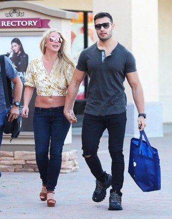 Britney Spears and her boyfriend Sam go shopping at an outlet mall.  Image: Britney Spears, Sam Asghari Ref: SPL5091025 170519 NOT EXCLUSIVE Image from: SplashNews.com Splash News and Pictures USA: +1 310-525-5808 London: +44 (0)20 8126 1009 Berlin: +49 175 3764 166 photodesk @splashnews.com World rights
