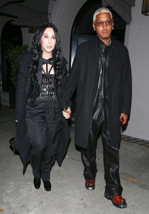 West Hollywood, CA - New couple alert?  Cher and Amber Rose's ex Alexander Edwards hold hands at Craig's in West Hollywood.  Later, the couple went to nightclub The Nice Guy with Tyga!  Pictured: Cher, Alexander Edwards BACKGRID USA 3 NOVEMBER 2022 USA: +1 310 798 9111 / usasales@backgrid.com UK: +44 208 344 2007 / uksales@backgrid.com *