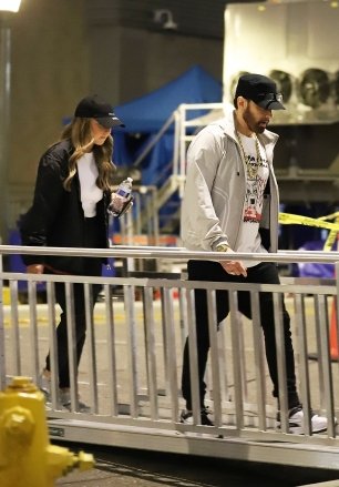 Los Angeles, CA - *EXCLUSIVE* - An extremely rare sighting of rapper Eminem with his daughter Hailie Jade as they exit rehearsals for the 2022 Rock and Roll Hall of Fame.  Eminem and Hailie are never usually photographed together.  Eminem, who just turned 50 on October 17, was spotted causally dressed as he left rehearsals with his eldest daughter.  The rapper also shares daughter Alaina Scott and son Stevie Laine Scott with ex-wife Kim Scott.  Eminem will be inducted into the Hall of Fame today, November 5, along with Pat Benatar and Neil Giraldo, Duran Duran, Eurythmics, Dolly Parton, Lionel Richie and Carly Simon.  Pictured: Eminem, Hailie Jade Children please pixelate face prior to publication*