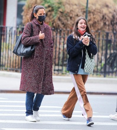 Actress Katie Holmes and daughter Suri enjoy a Sunday afternoon together all smiling and laughing on March 20, 2022 in Soho, New York City, NY, USA.  Katie shows her nose and ear piercing.  Photo by Dylan Travis/ABACAPRESS.COMPicted: Katie Holmes,Suri CruiseRef: SPL5297803 200322 NON-EXCLUSIVEPicture by: AbacaPress / SplashNews.comSplash News and PicturesUSA: +1 310-525-5808London: +44 (0)20 8126 1009Berlin: +49 175 3764 166photodesk@splashnews.com United Arab Emirates Right, Australia Right, Bahrain Right, Canada Right, Greece Right, India Right, Israel Right, South Korea Right, New Zealand Right, Qatar Right, Right of Saudi Arabia, Singapore rights, Thailand rights, Taiwan rights, United Kingdom rights, United States rights