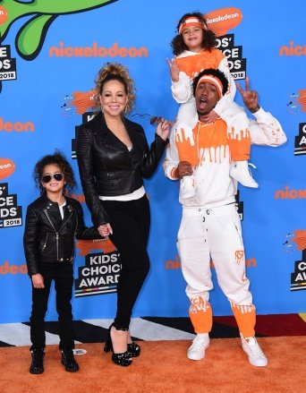 Nick Cannon, Mariah Carey, Moroccans, Monroe.  Mariah Carey, center left, Nick Cannon, center right, and from left their children Monroe and Moroccan arrive at the Kids' Choice Awards at The Forum Kids' Choice Awards 2018 - Arrivals, Inglewood, U.S. - 24 2018 in Inglewood, California