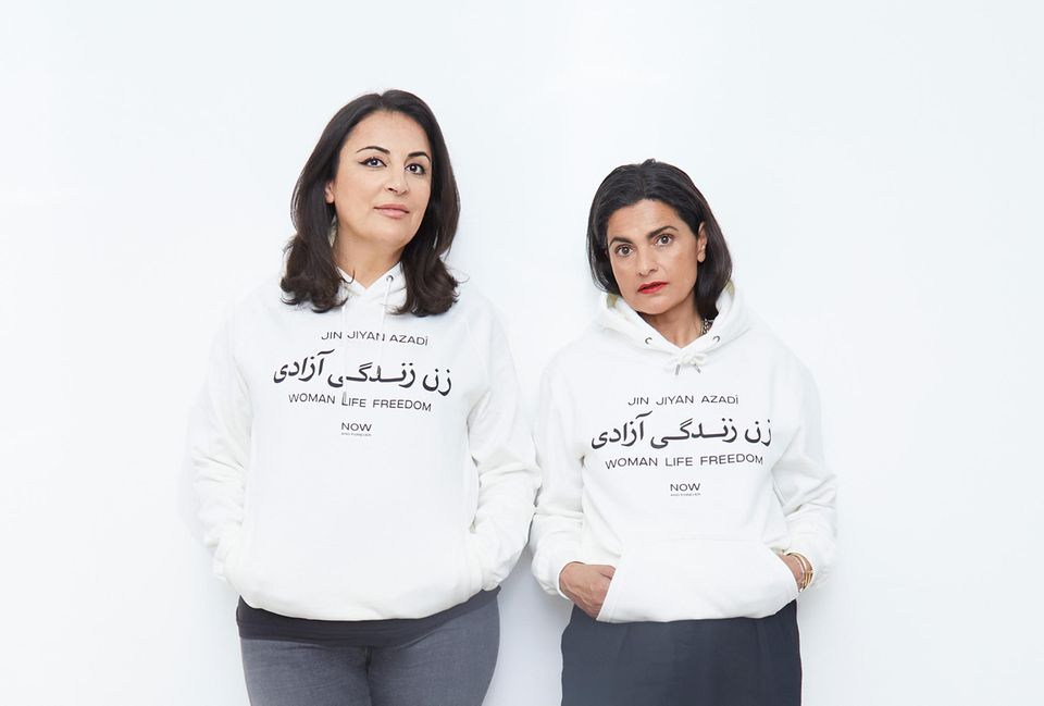 Düzen Tekkal and Leyla Piedayesh set an example with a statement hoodie.